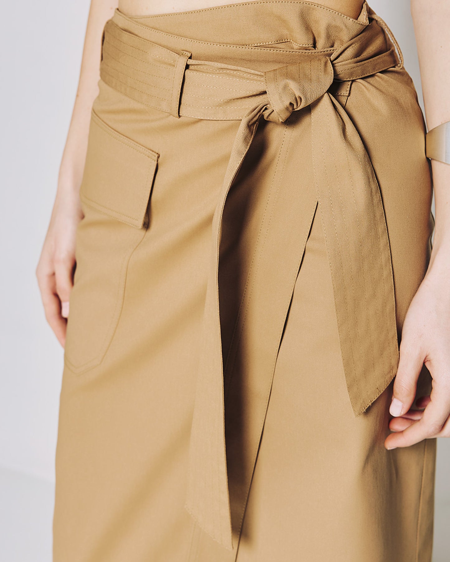 Asymmetric wrap skirt