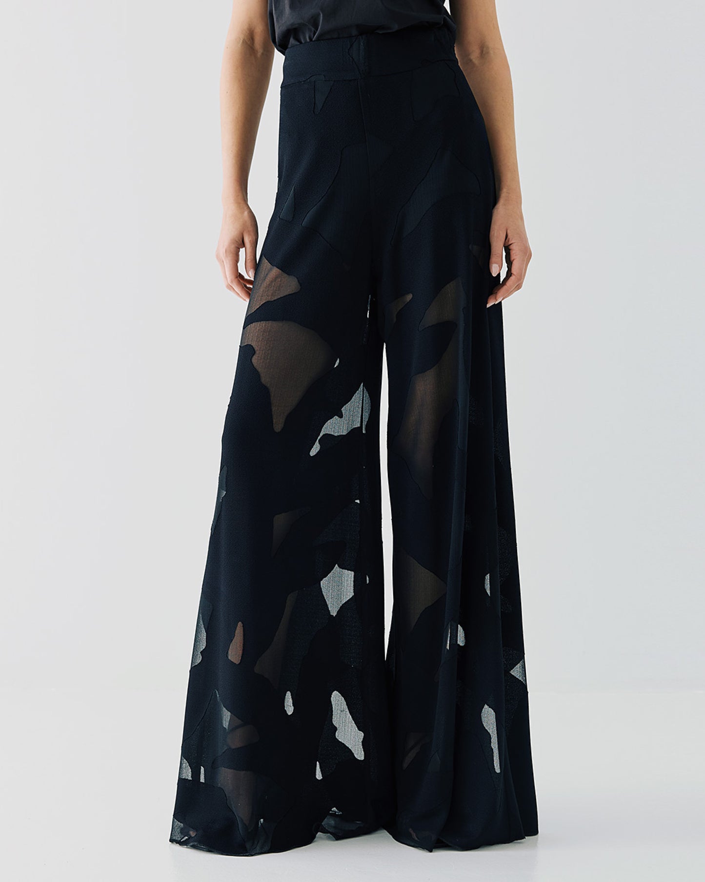 Pants with a mesh pattern