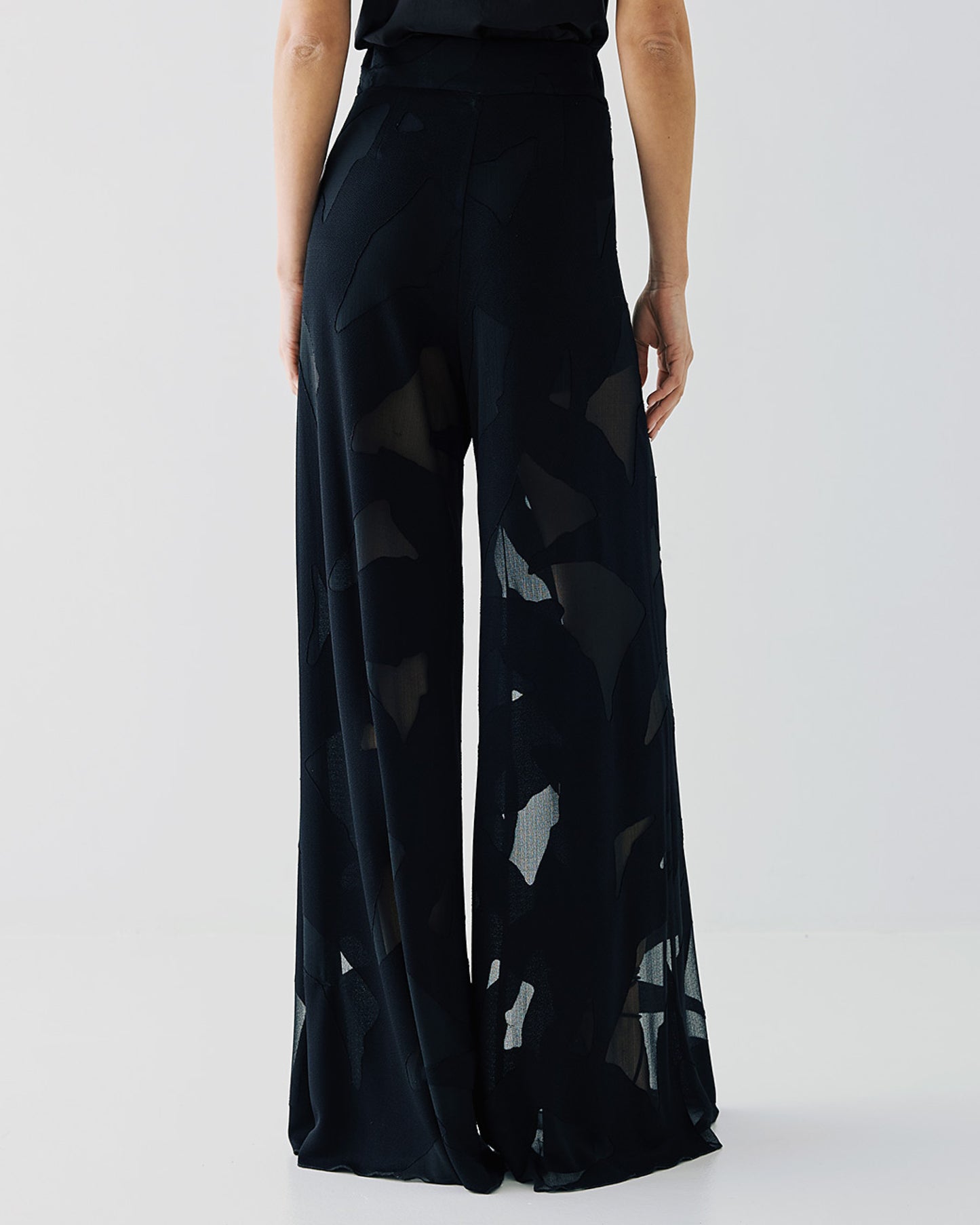 Pants with a mesh pattern