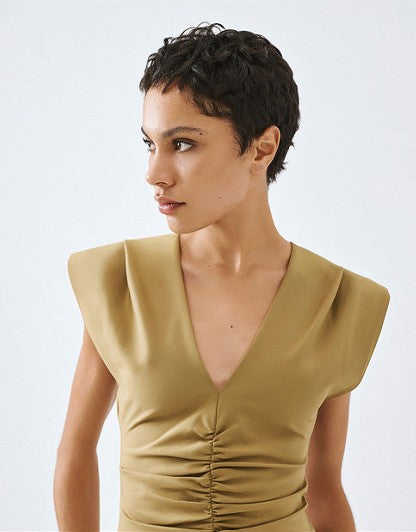 Dress with a V neckline and ruched