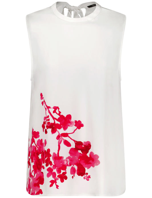 Ärmellose Bluse mit floralem Detail
