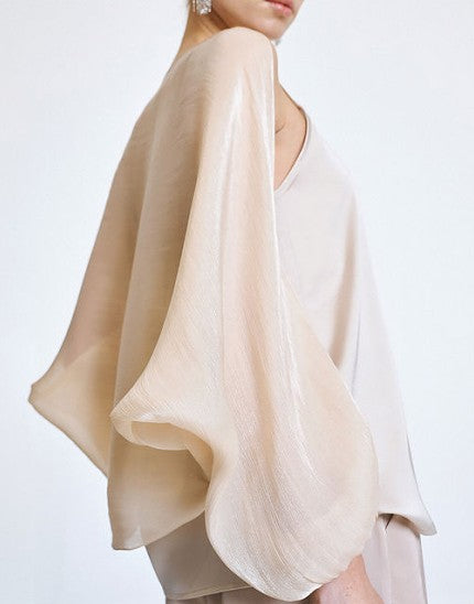Bolero with metallic finish