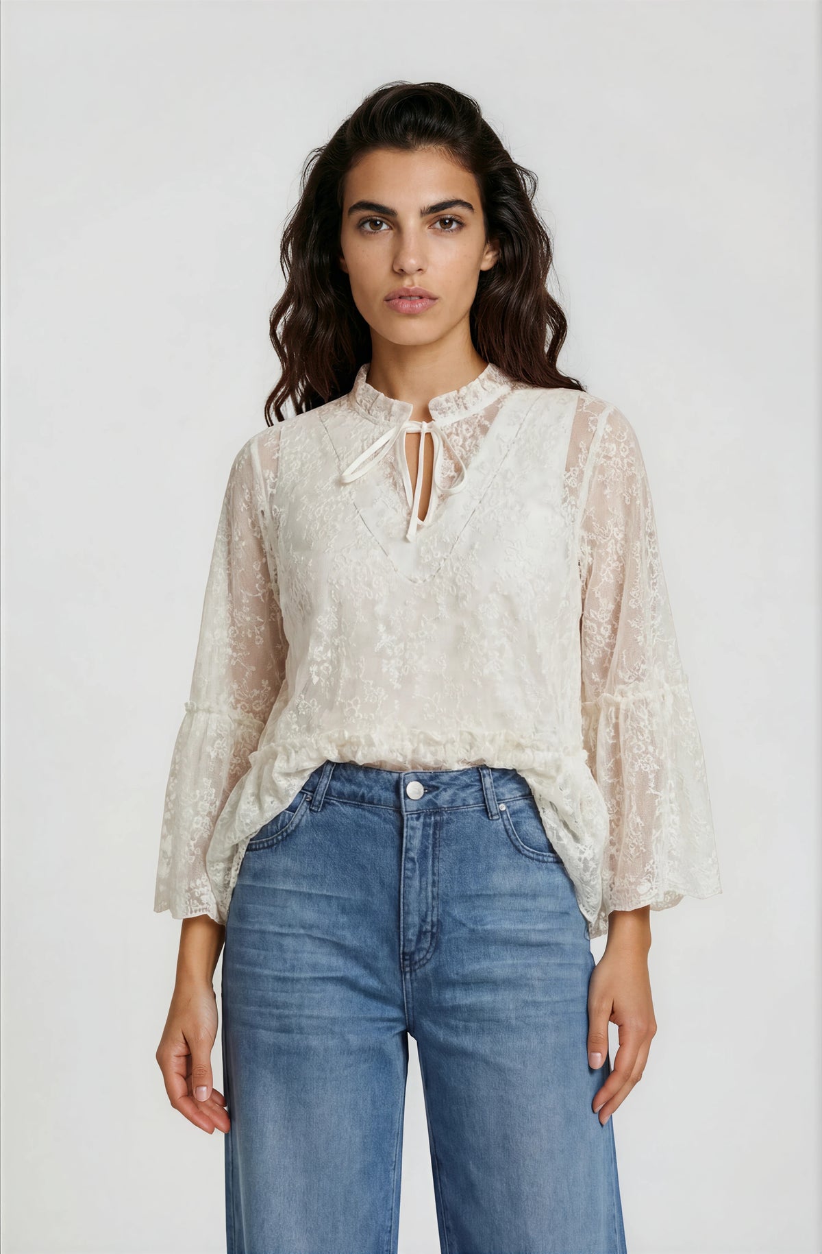 blouse with ruffle on neck, layered flounce on sleeve and hem
