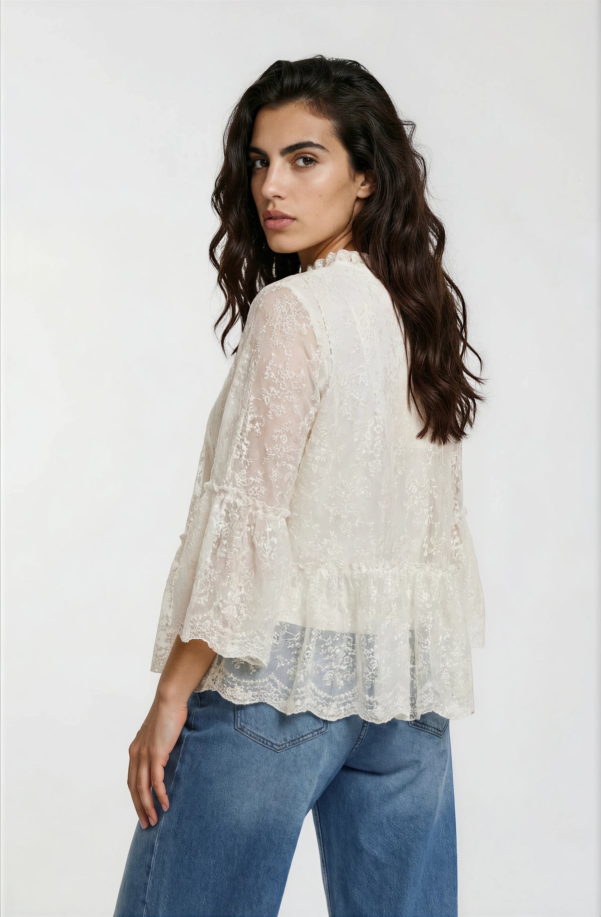 blouse with ruffle on neck, layered flounce on sleeve and hem
